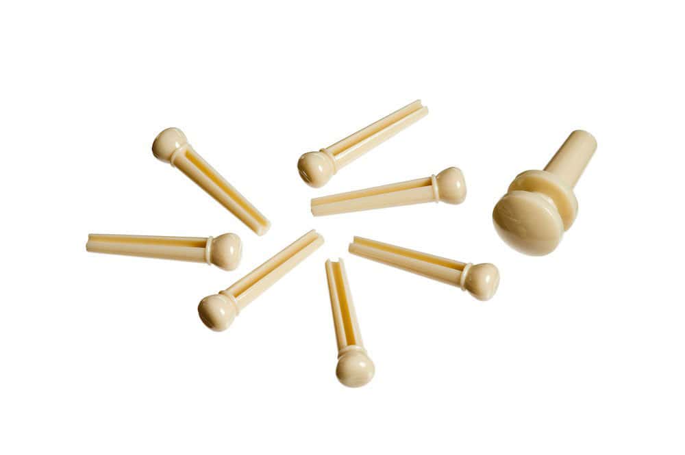 D'ADDARIO AND CO INJECTED MOLDED BRIDGE PINS WITH END PIN SET OF 7 IVORY