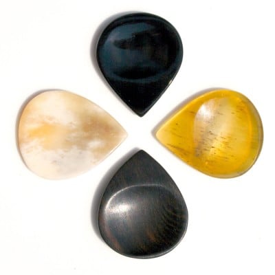 4 MIXED BONES AND HORN GUITAR PICKS GROOVE TONES