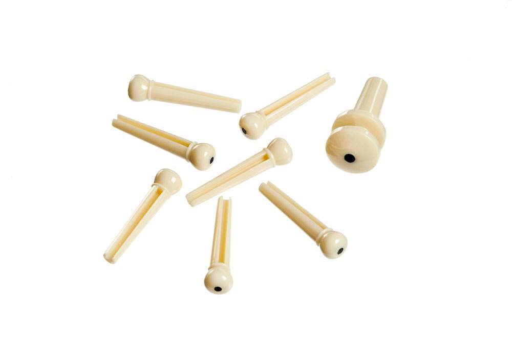 D'ADDARIO AND CO INJECTED MOLDED BRIDGE PINS WITH END PIN SET OF 7 IVORY WITH BLACK DOT
